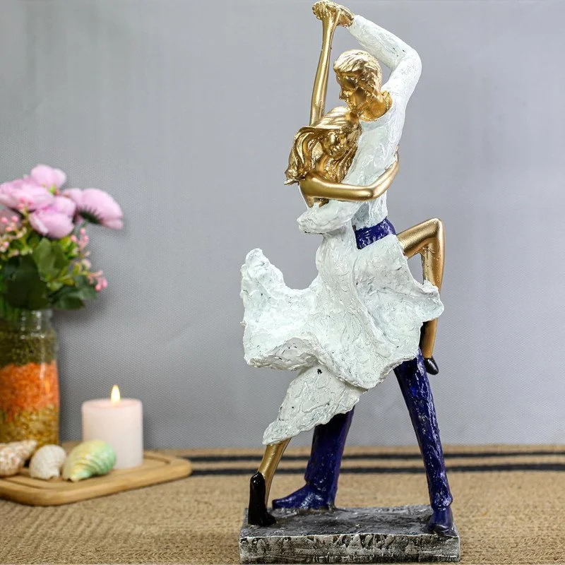 Ceramic Dancer Statue: Gold Accents, Textured Finish