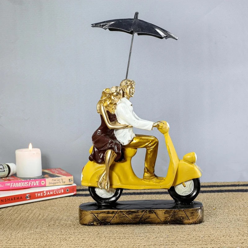 handicraft gift item Romantic Couple Riding Yellow Scooter Statue – A Symbol of Love and Adventure